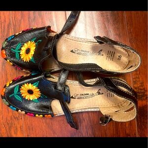 Mexican leather huaraches embroidered.